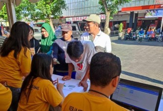 Situasi Pekerja Informal Daftar Peserta ke BPJS Ketenagakerjaan Cabang Blitar di Pasar Pon Kota Blitar