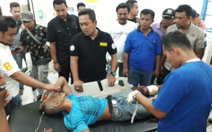 Pelaku pembunuhan saat mendapat perawatan medis