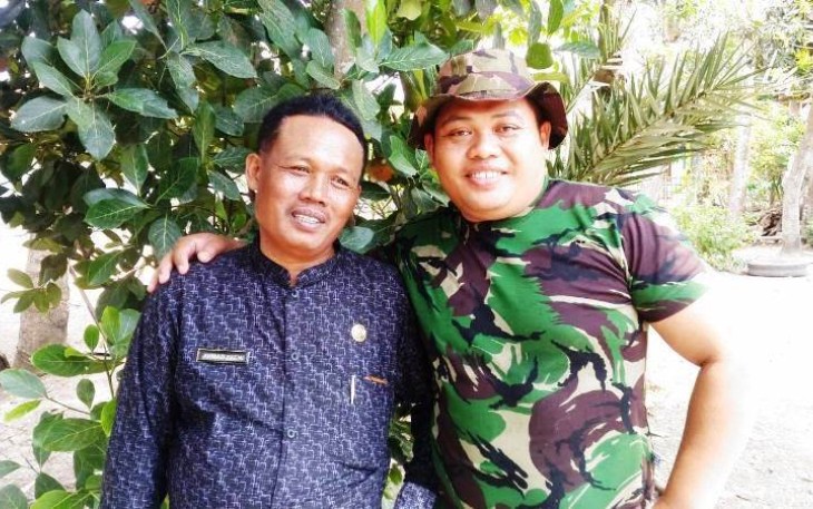 Kepala Desa Jatimulya Ahmad Zaeni bersama Satgas TMMD tegal usai tinjau lokasi