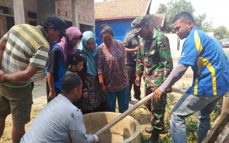 Salah satu sumur warga yang dialih fungsi sebagai penampung air bersih