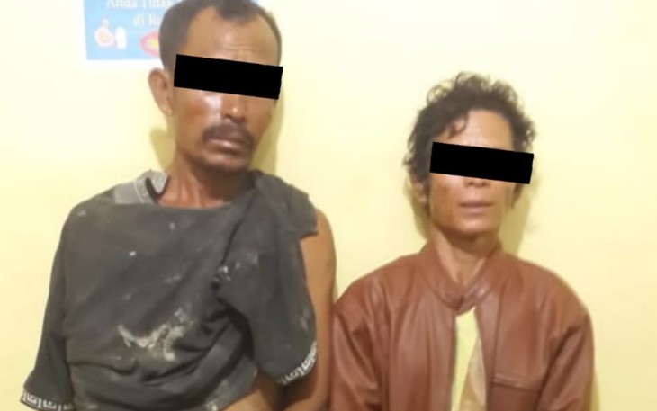 Dua orang tersangka saat ditangkap