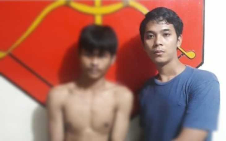 Pelaku Albet Sulistiawan (Kiri) saat diamankan polisi