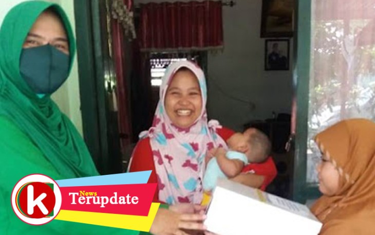 Ketua Persit Cabang LXII Kodim 1310 Berikan Bantuan Kebutuhan Gizi Anak dan Perempuan Rentan Terdampak Covid-19