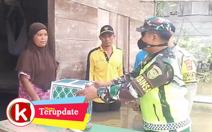 Kegiatan Bhabinkantibmas dan Babinsa berikan Bantuan Paket Sembako Kepada Masyarakat Dampak Covid19 dan Banjir di Kecamatan Ma Tembesi