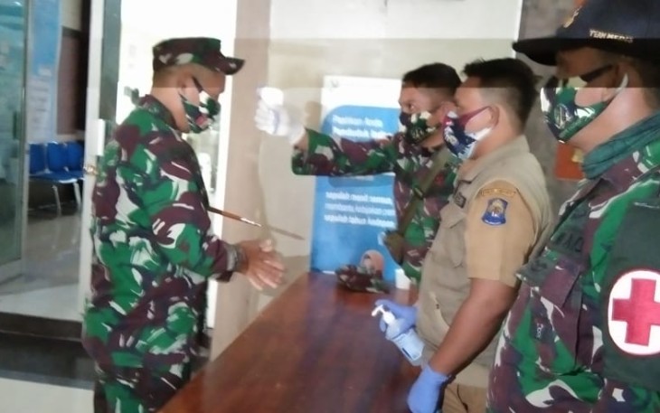Protokol kesehatan dijalankan dalam penandatanganan dan penyerahan MOU TMMD ke-108 TA. 2020 Kodim 1425/Jeneponto