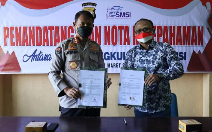 Kabid Humas Polda Bengkulu Kombes Pol Sudarno S Sos MH (KIRI) dan ketua SMSI Bengkulu Wibowo Susilo