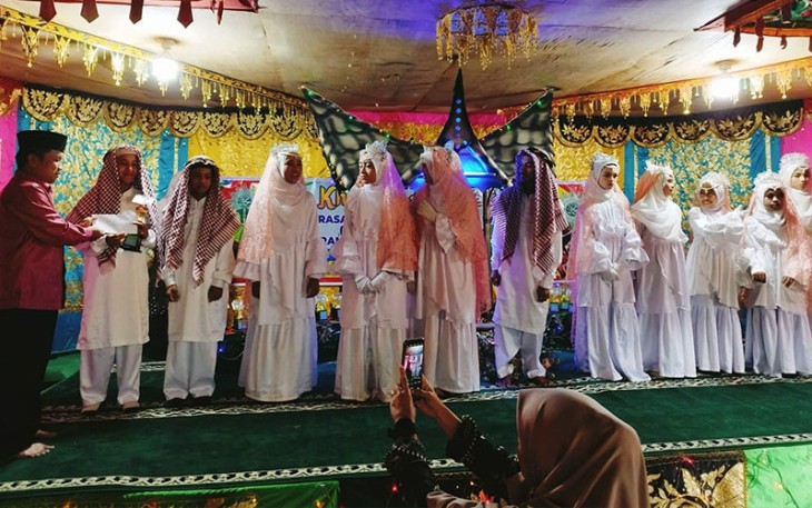 Santri Madrasah Diniyah Takmiliyah Awaliyah (MDTA) Muhammadiyah ranting Matur Hilia, Kecamatan Matur mengikuti khatam Al-Qur’an.