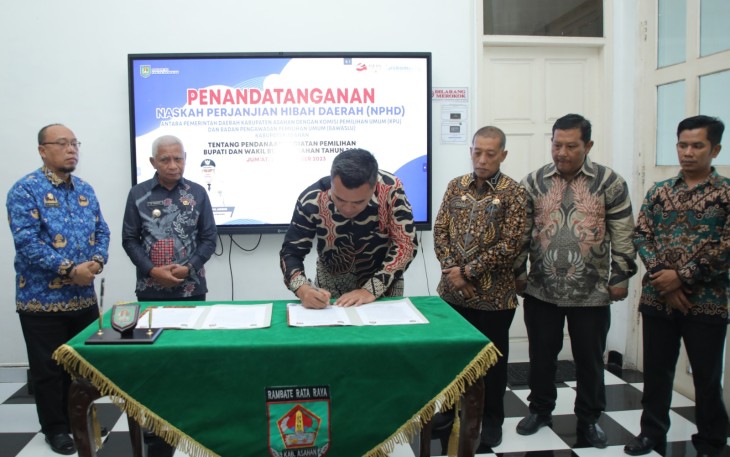 Penandatanganan NPHD Antara Pemerintah Daerah Kabupaten Asahan dengan KPU Kabupaten Asahan