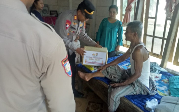Polsek Putri Hijau Bagikan 25 Paket Bansos Untuk Masyarakat Putri Hijau