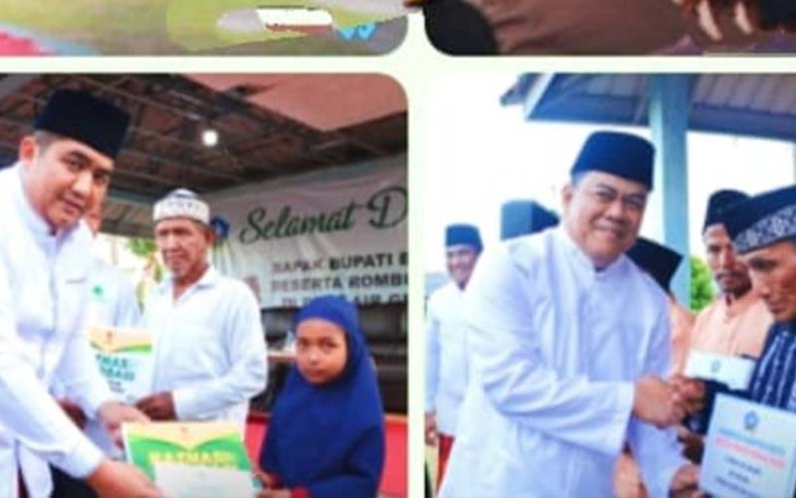 Bupati Bintan Roby dan Sekda Bintan saat serahkan bantuan secara simbolis.