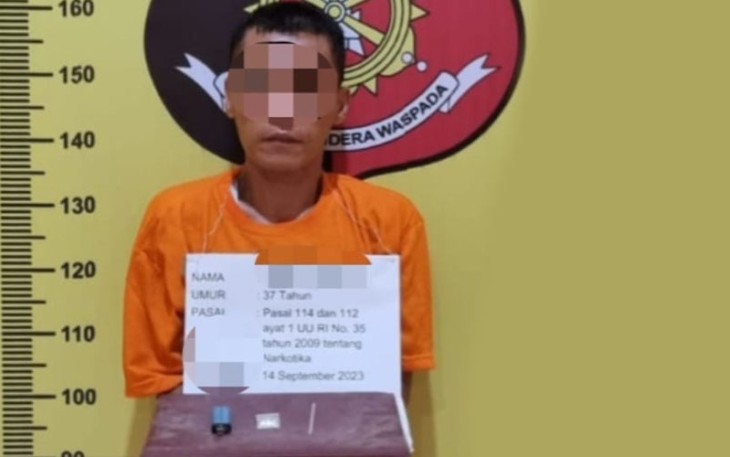 MS dan barang bukti di Polsek Padang Bolak.