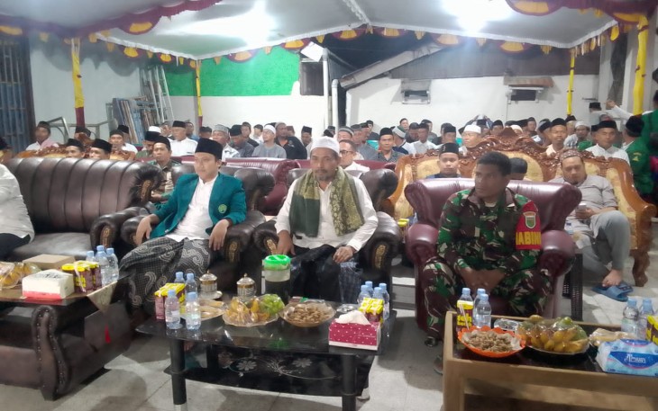 Serda Novian Namudat (Babinsa Koramil 1710-02/Timika) saat menghadiri undangan warga dalam rangka peresmian Mushola Al-Ikhlas Jl. Kartini Distrik Mimika Baru, Kab. Mimika, Sabtu (10/02/2024).