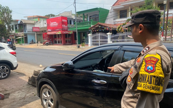 TKP kasus pencurian pecahkan kaca mobil