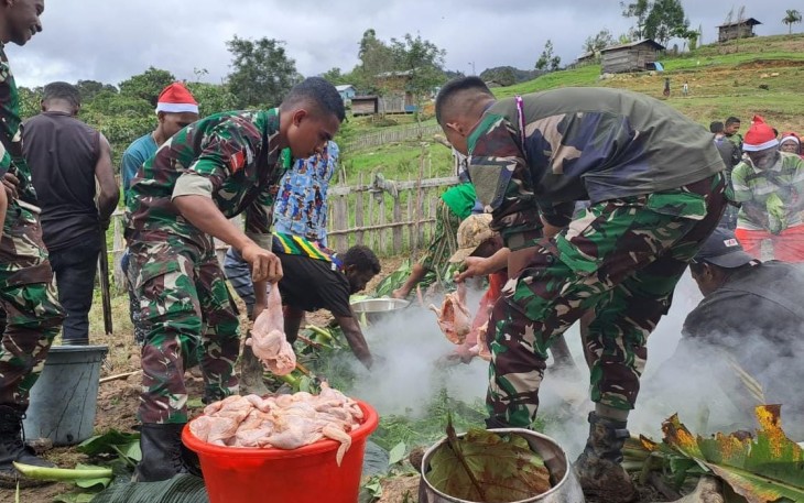 Tradisi Bakar Batu