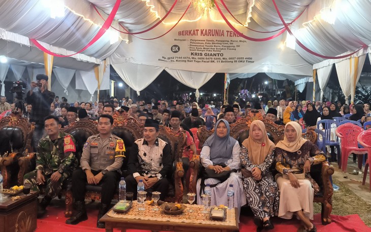 Polsek Belitang III Hadiri Acara Pagelaran Wayang Kulit di Desa Karang Sari
