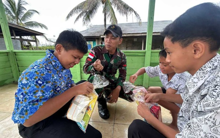 Kado tahun baru satgas Yonzipur 5/ABW