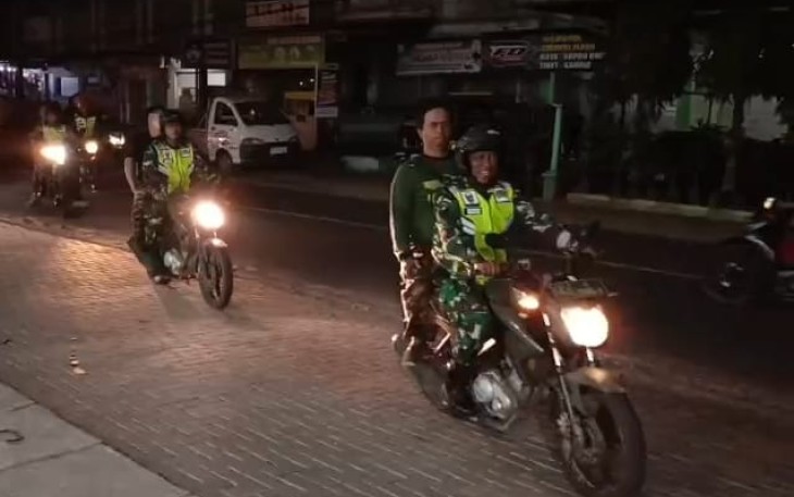 Patroli bersama Banser di wilayah desa binaan 