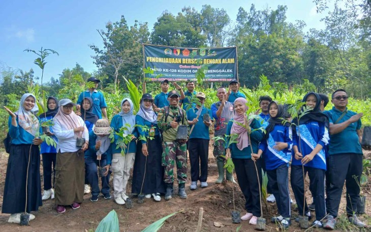 Kegiatan tanam pohon di lokasi TMMD