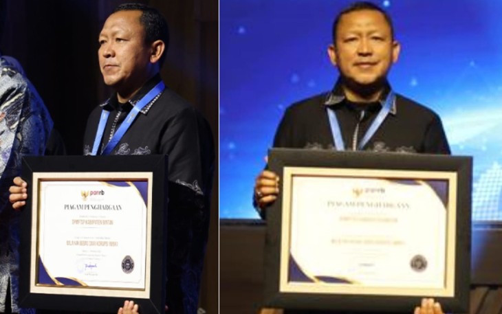 Plt Kepala DPMPTSP Bintan, Rusli, saat menerima penghargaan