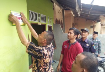 Dinsos Batu Bara Launching Pemasangan Stiker Penerima PKH di Medang Deras