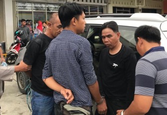 Ketiga pelaku saat diringkus polisi