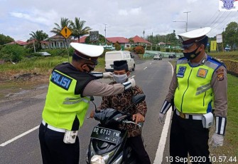 Peran Polisi Cegah Penyebaran Covid-19