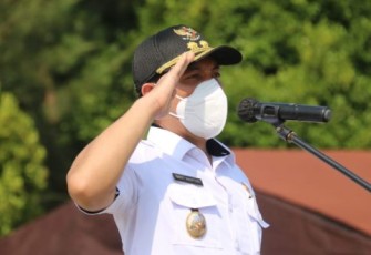 Plt Walikota Dedy Wahyudi saat menjadi inspektur upacara apel gelar kesiapan antisipasi bencana daerah di Kota Bengkulu
