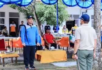 Bupati Labuhanbatu dr.H.Erik Adtrada Ritonga,MKM saat bertindak sebagai Inspektur Upacara Haornas tahun 2022 