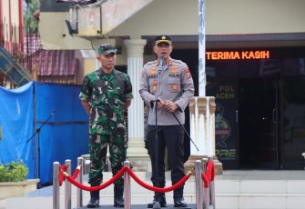 omandan Kodim (Dandim) 0104/Atim Letkol Inf Agus Al-Fauzi, S.IP, M.IPol. bersama Kapolres Aceh Timur AKBP Andy Rahmansyah, S.I.K. pada Senin, (14/11/2022) memimpin Apel Sinergitas TNI-Polri di Lapangan Sarja Arya Racana.
