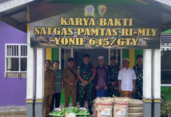 Karya bakti Satgas Yonif 645/Gty