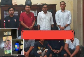 Tersangka (diborgol) saat diamankan