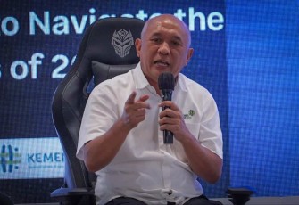 Menteri Teten Masduki saat memberikan paparan dalam acara Digital Acceleration Summit di Bukalapak Headquarter, Cilandak Jakarta, Kamis (12/1)