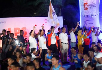 Run The City dan LPS Monas Half Marathon HUT Kompas Grup, Minggu (2/7)