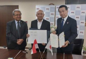 MenkopUKM Teten Masduki saat mendatangi MoU dengan SMRJ di Tokyo Jepang, Senin (31/7)