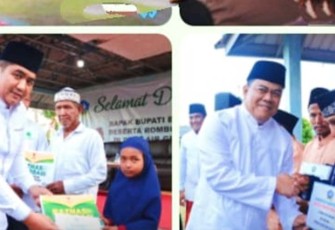 Bupati Bintan Roby dan Sekda Bintan saat serahkan bantuan secara simbolis.