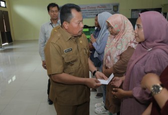 Pemerintah Kabupaten Asahan Serahkan Buku Tabungan Pinjaman Bergulir