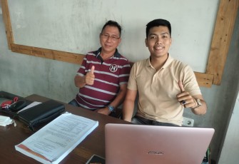 Marshall Tambajong, SH.,MH bersama Kliennya Hendrik Yacobus