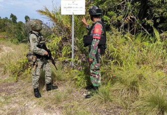 Patroli patok satgas Yonarmed 10 Brajamusti dan TDM Malaysia, Senin (5/2)