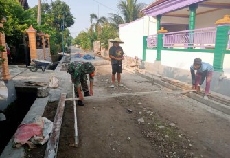 Bangun jalan di wilayah desa binaan 