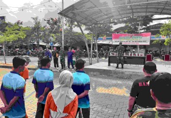 Karya Bakti Teritorial Prima Bersihkan Pasar Minulya