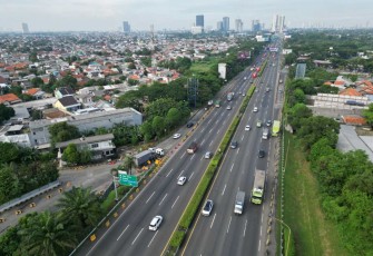 Ilustrasi kendaraan di jalan tol