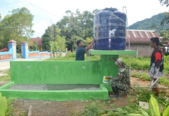 Pengecatan warna hijau sumur bor sasaran fisik TMMD Kodim Parepare 
