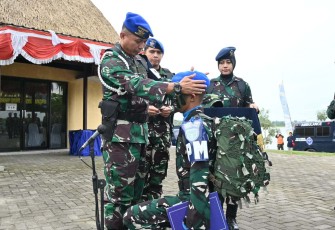 Wadanpuspomau memberikan baret biru 