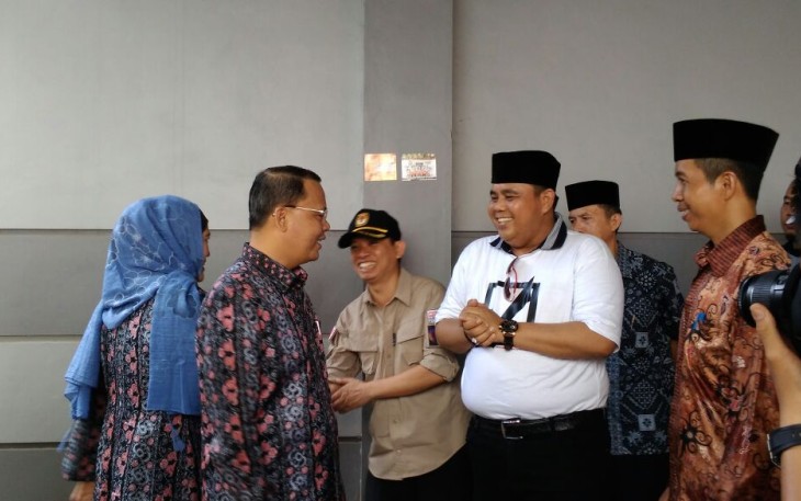Ketua KPU Kota Bengkulu Darlinsyah saat bertemu Plt Gubernur Bengkulu Rohidin Mersyah