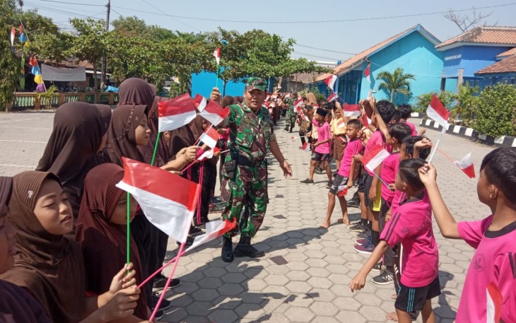 Untuk Lindungi Generasi Muda dari dampak Globalisasi Satgas TMMD Kodim Demak ajarkan lagu perjuangan