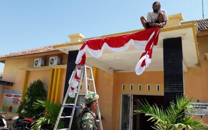 Satgas TMMD Pelopori Pemasangan Bendera