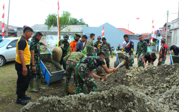 Sinergi TNI-POLRI  Sukseskan TMMD ke -107 