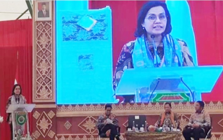 Sri Mulyani saat sambutan dalam rapat kerja Percepatan Penyaluran Bantuan Dana Desa di Palembang