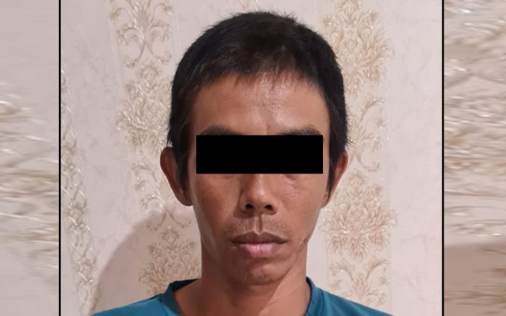 Tersangka ES saat diamankan