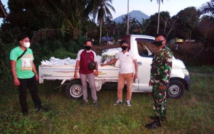 Babinsa Koramil Dimembe Dampingi Penyaluran Bibit Jagung
